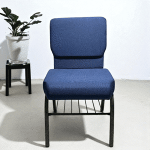 Modern blue chair with black metal frame and potted plant in background.