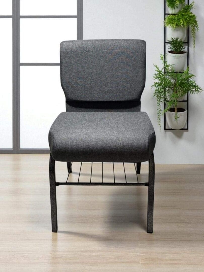 Modern gray upholstered chair with metal frame and storage rack under seat.