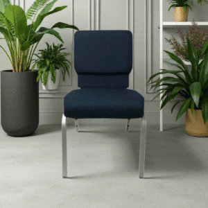 Modern navy blue chair with metal legs between indoor plants.