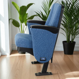 Blue theater seat with black armrests and wooden floor.
